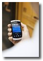 Man_holding_phone_1.jpg