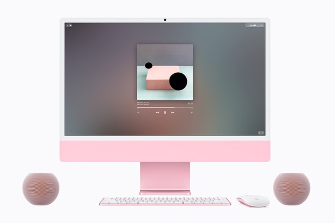 Deux HomePod mini 2 roses utilisés comme haut-parleurs d’un iMac. © Apple Deux HomePod mini 2 roses utilisés comme haut-parleurs d’un iMac. © Apple